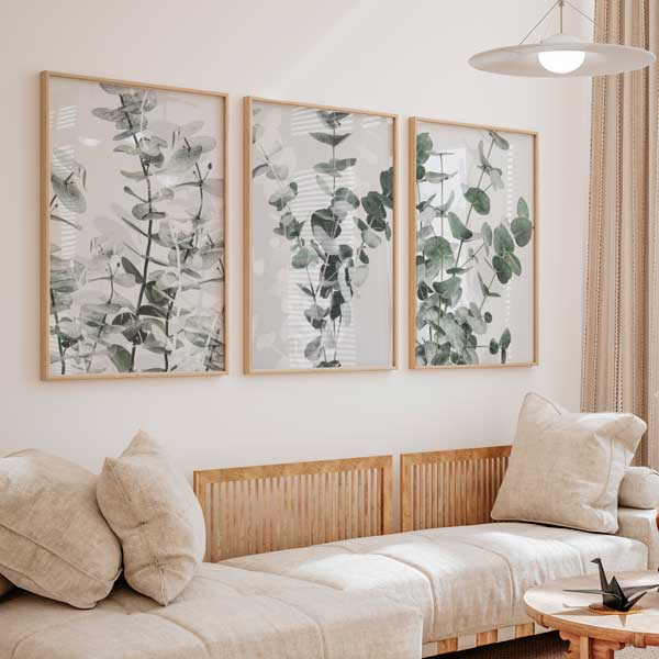 conjunto de tres cuadros florales de estilo decorativo nórdico encima del sofá - kuadro