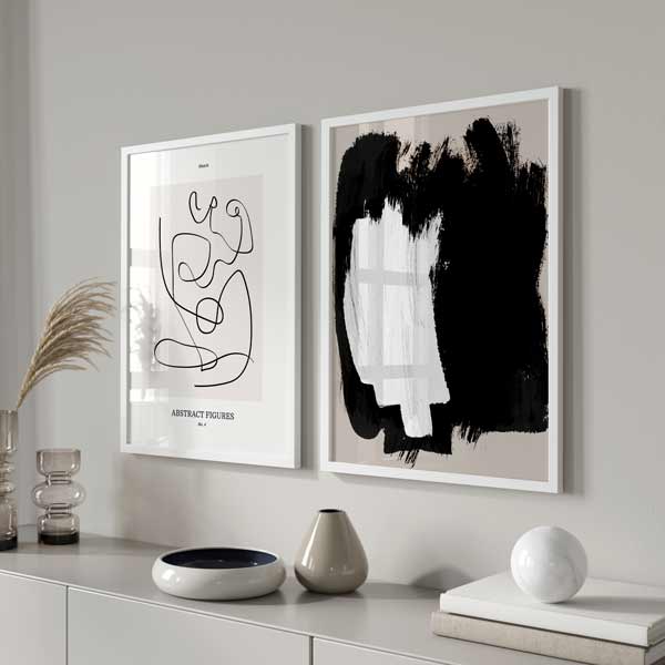 Cuadro minimalista y abstracto en negro y blanco sobre fondo beige - idea de decoración con cuadros