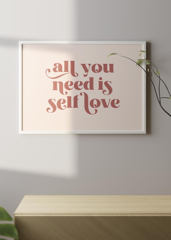 decoración con cuadros, ideas - Cuadro en horizontal con frase "All you need is self love" en tonos rosados