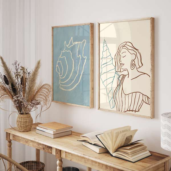 decoración con cuadros, ideas - Cuadro de ilustración artística de mujer y caracola en trazo de dibujo. Una obra en tonos crema, marrón y azul