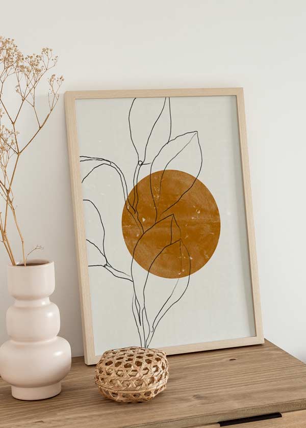 decoración con cuadros, ideas - lámina decorativa con flor y sol en estilo abstracto y colores tierra y beige - kuadro
