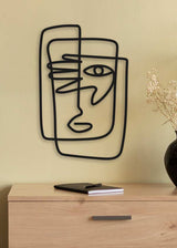 decoración con cuadros, ideas - cuadro metálico abstracto con cara, aluminio negro - kuadro