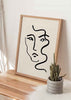 decoración con cuadros, ideas - lámina decorativa de ilustración artística de rostro de mujer sobre fondo beige - kuadro